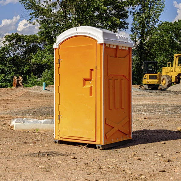 how often are the portable restrooms cleaned and serviced during a rental period in Artie